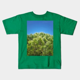 green pine and blue sky Kids T-Shirt